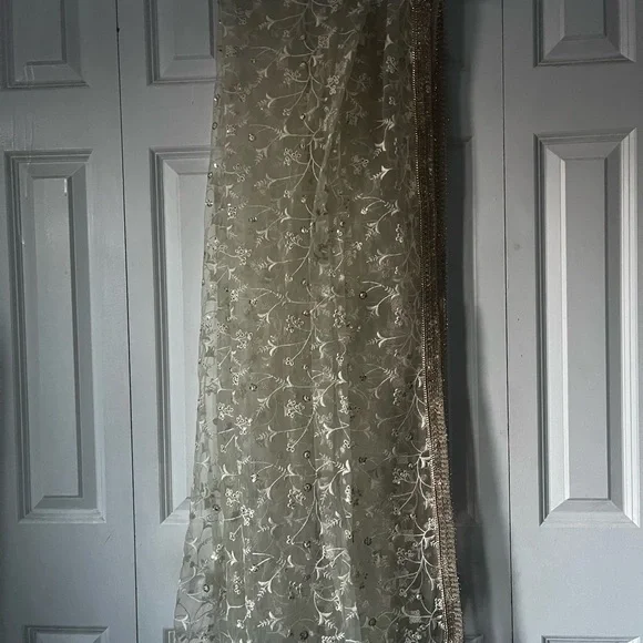 Turquoise Net Embroidered Lehenga Choli - Picture 7 of 9